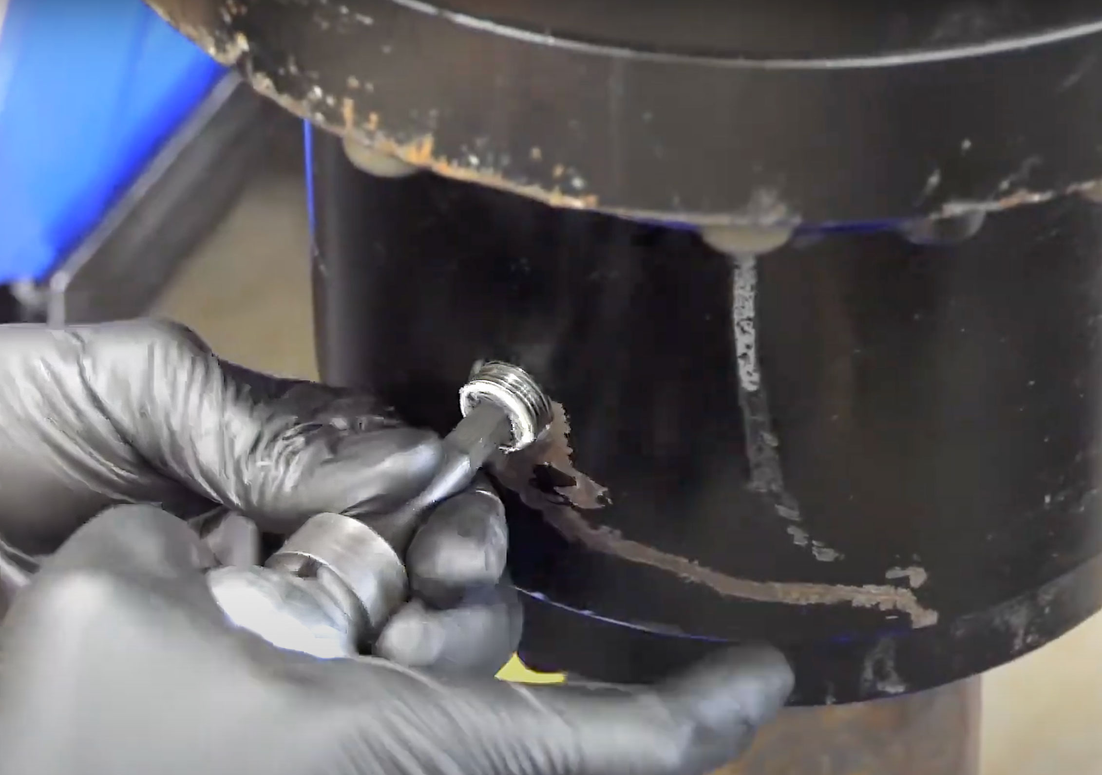 Removing the drive head drain plug with 8mm Allen